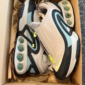 Nike Light Gray Sneakers with Neon Yellow Accents